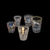Five clear glasses decorated in enamel