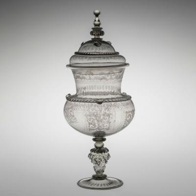 Pear-shaped, covered clear glass goblet with engraved decorations