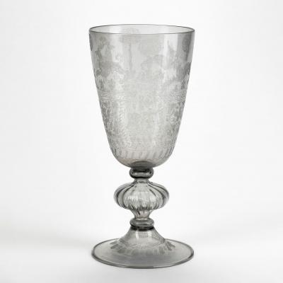 Clear glass goblet engraved with a stag, a unicorn, and hounds, and the owners' initials RT and AT entwined by lover's knots